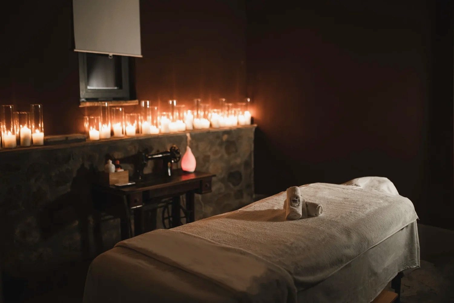 Spa massage room by candlelight